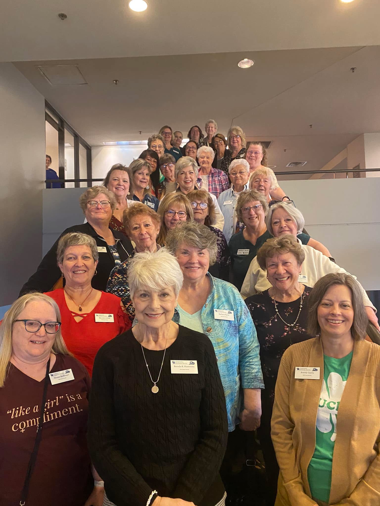 KEHA Board members standing on stairs